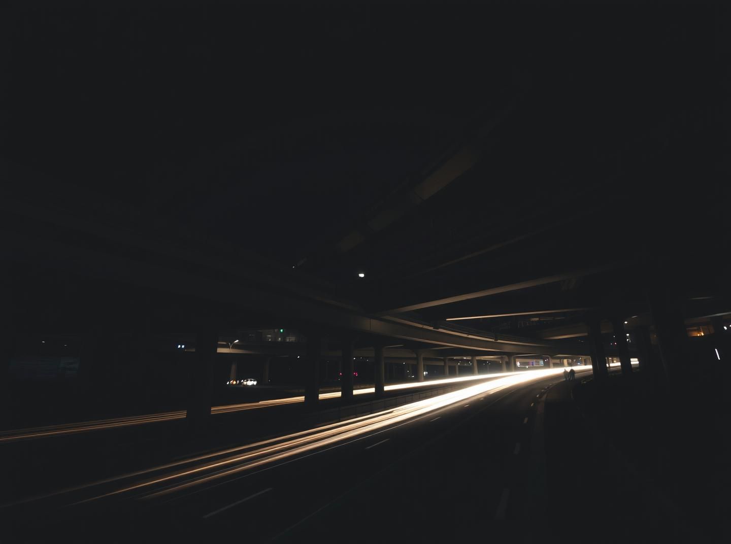 Energetic Highway Interchange at Night: Light Trails in Stunning 8K
 | Unfold Lens