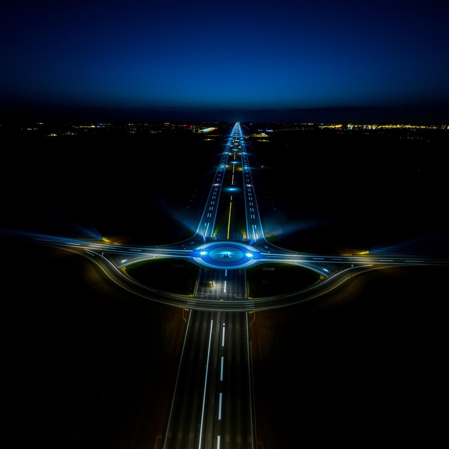 Twilight Airport Runway: Radiant Aviation Lights & Circular Road 8K
 | Unfold Lens